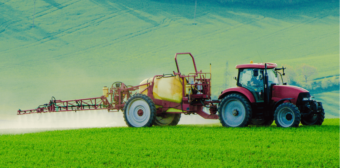 tractor in a green field